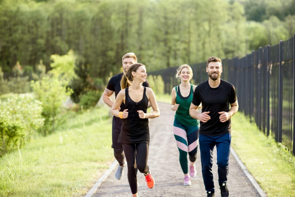 Friends jogging outdoors