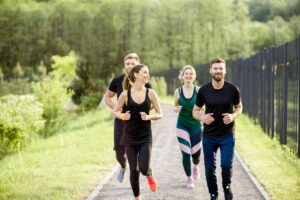 Friends jogging outdoors